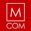 M COM M COM